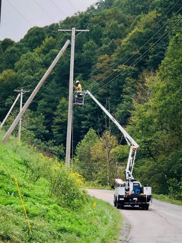 A Point Broadband crew installs fiber in the Home Creek community in Buchanan County.